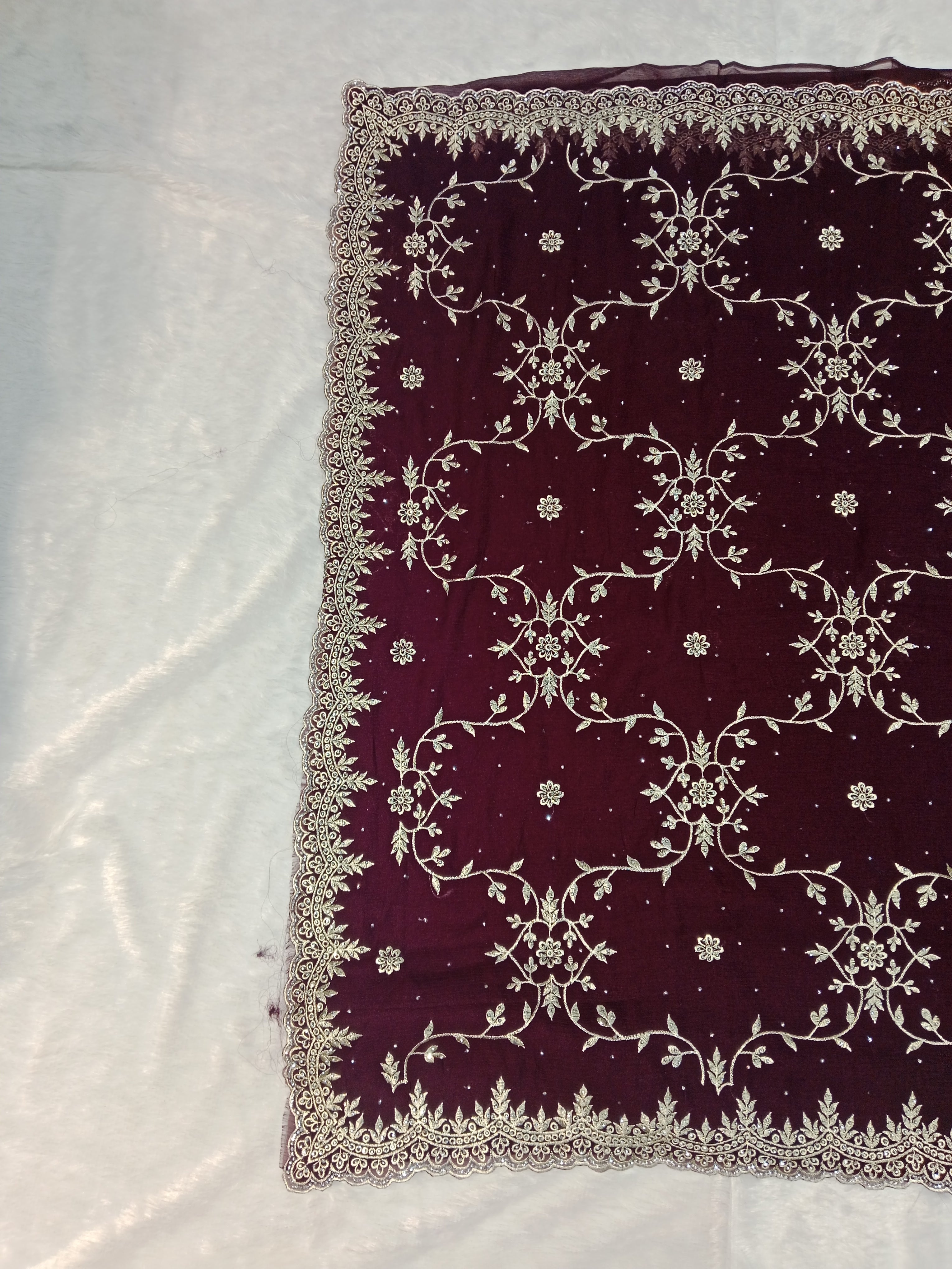 PLUM GEORGETTE SAREE WITH SILVER ZARI