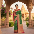 EMERALD GREEN BANARASI SILK SAREE WITH RANI PINK CONTRAST