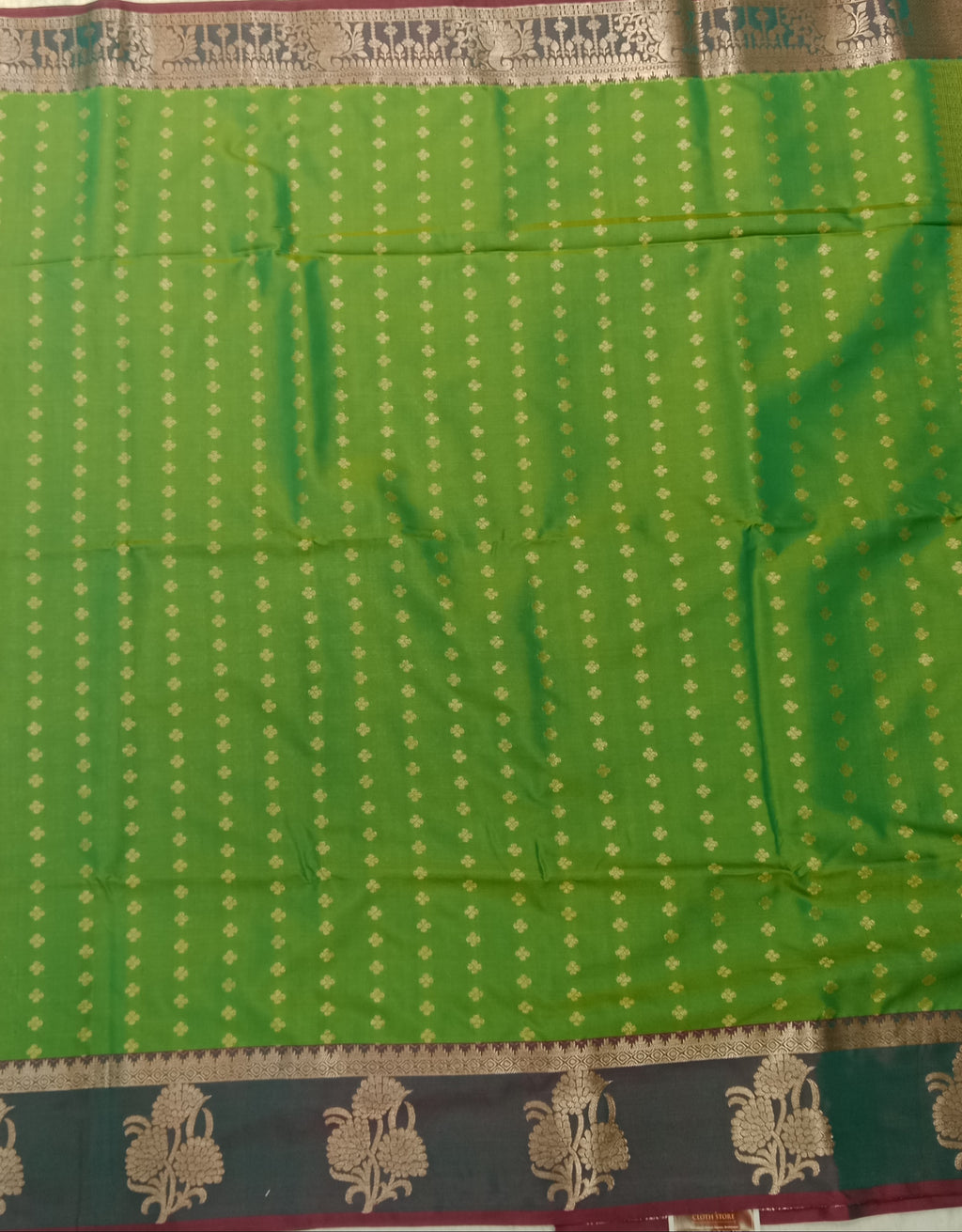 PARROT GREEN KANCHIPURAM SILK SAREE WITH PEACOCK BLUE CONTRAST BORDER