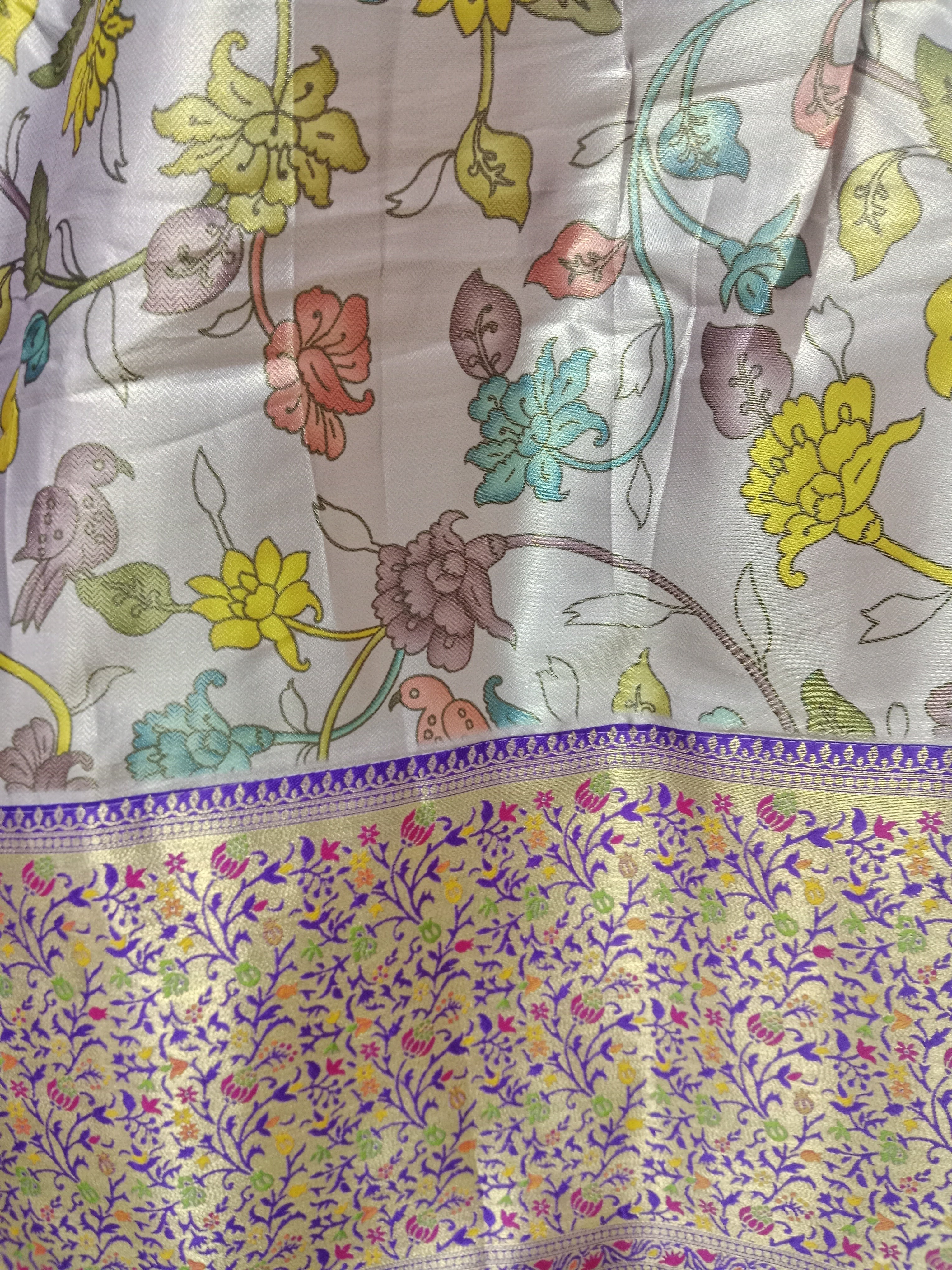 LAVENDER- SILVER LEHENGA WITH MULTICOLOUR FLORAL JAAL PRINT+ THAT RICH BROCADE BORDER