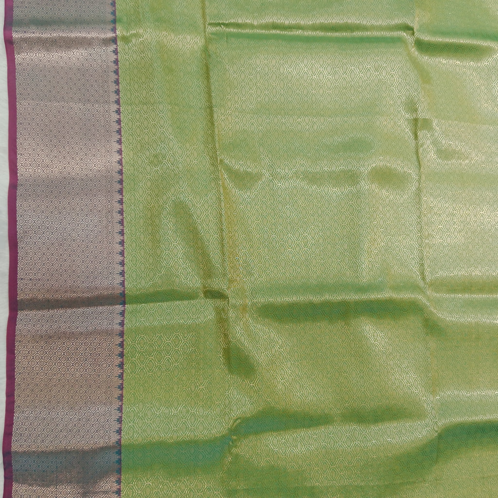 PARROT GREEN KANCHIPURAM SILK SAREE WITH PEACOCK BLUE CONTRAST BORDER
