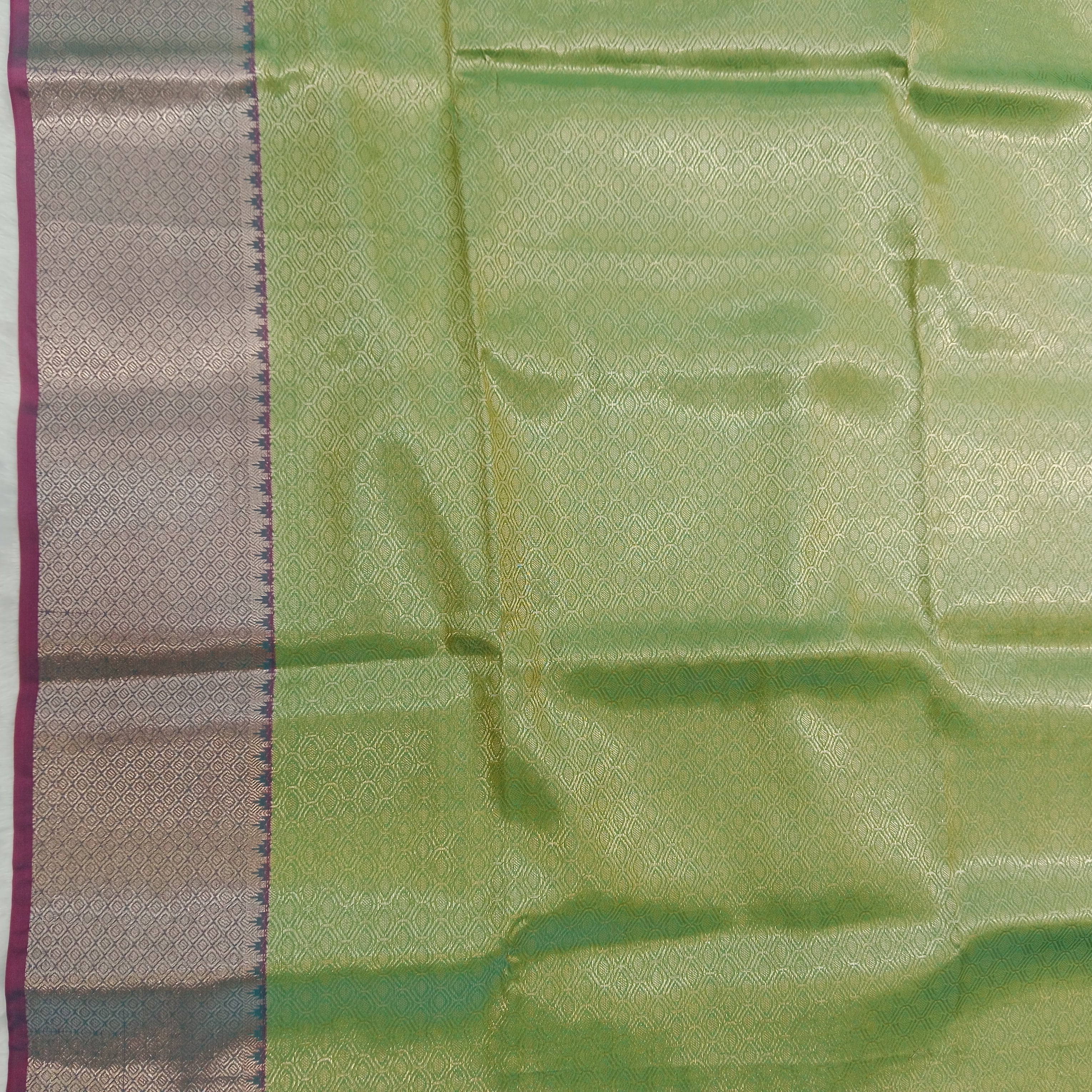 PARROT GREEN KANCHIPURAM SILK SAREE WITH PEACOCK BLUE CONTRAST BORDER