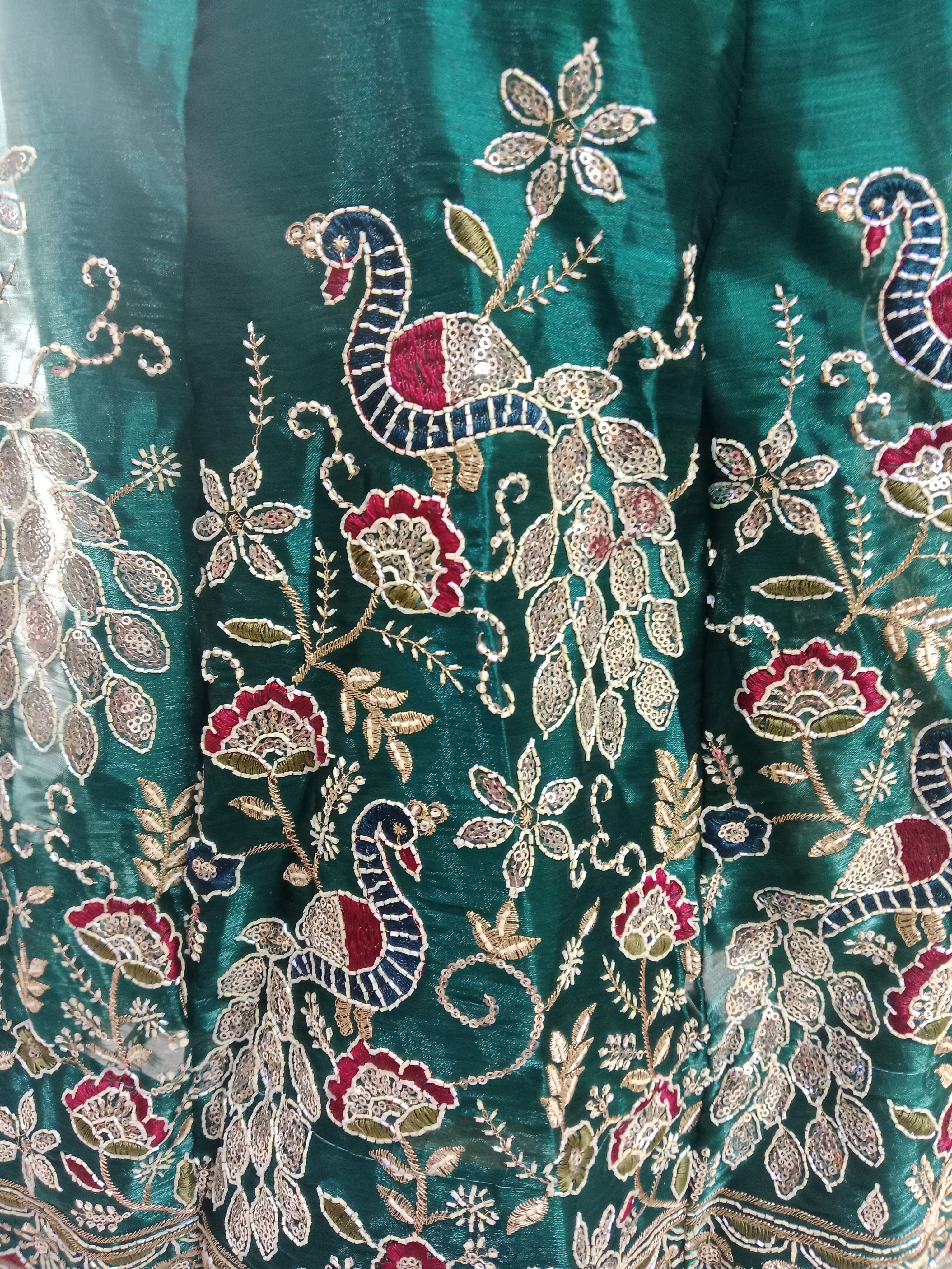 EMERALD GREEN LEHENGA WITH WHITE+ RED PEACOCK BORDER WORK