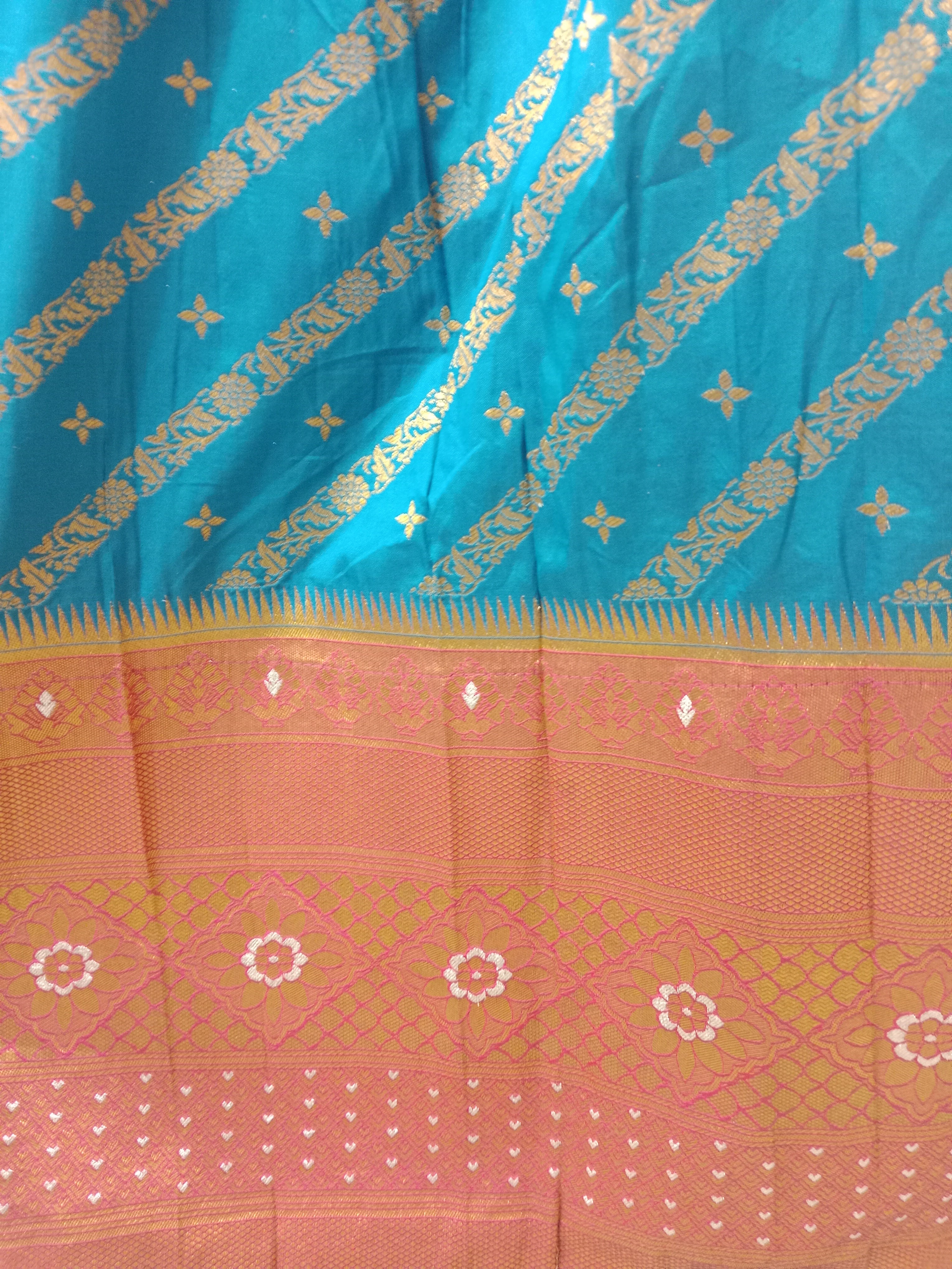 TEAL BLUE LEHENGA WITH GOLD ZARI  STRIPES WITH COPPER BROCADE BORDER