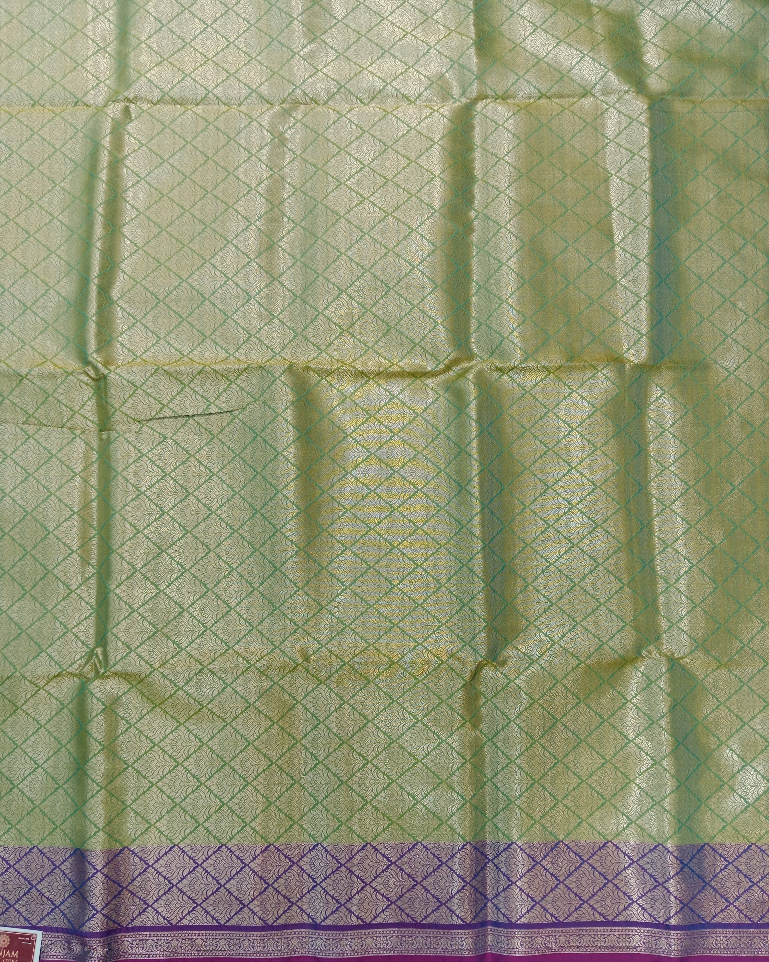 PARROT GREEN KANCHIPURAM SILK SAREE WITH VIOLET CONTRAST BORDER