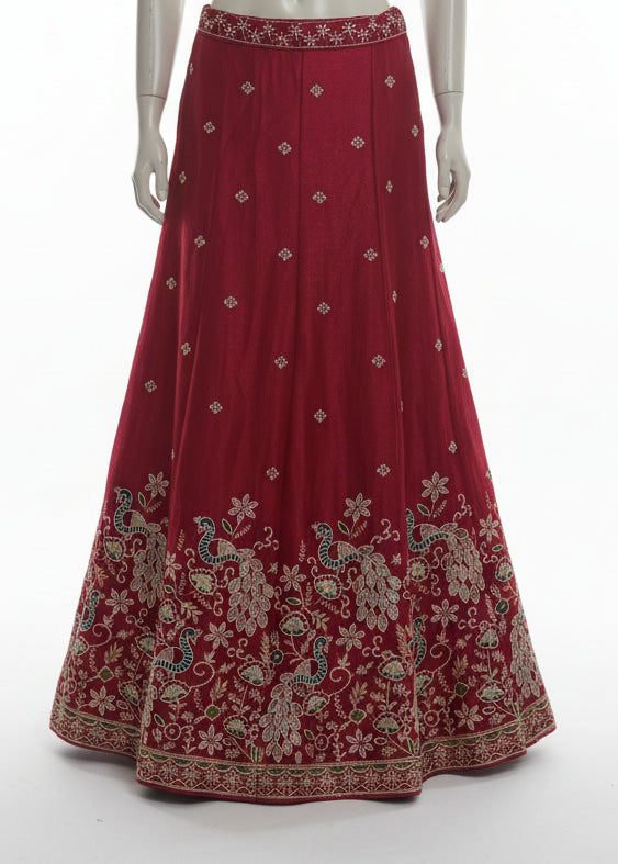 MAROON LEHENGA WITH THE WHITE TEAL PEACOCK BORDER