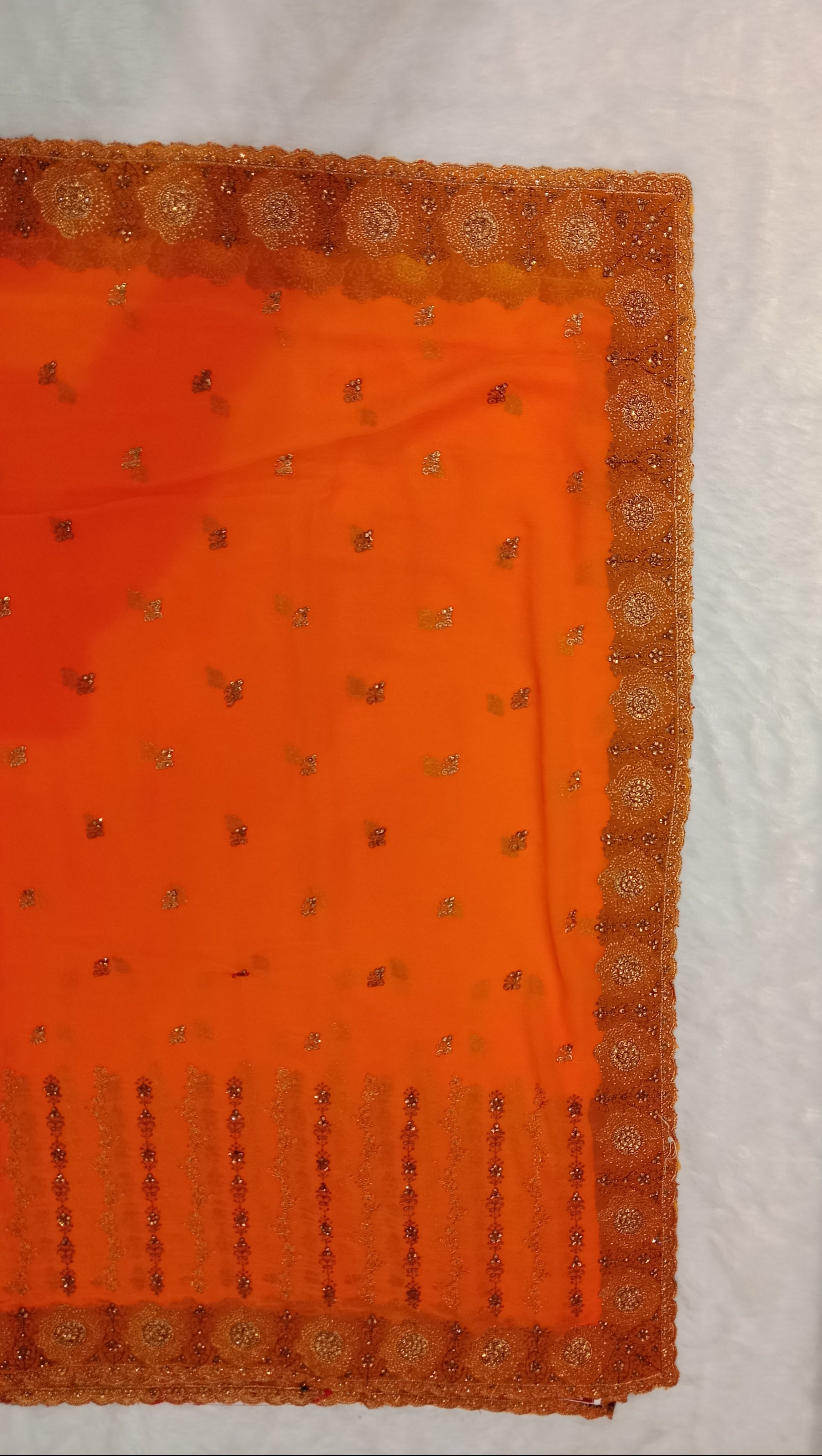 BRIGHT TANGERINE GEORGETTE SAREE WITH ZARI+ CUTDANA BORDER WORK