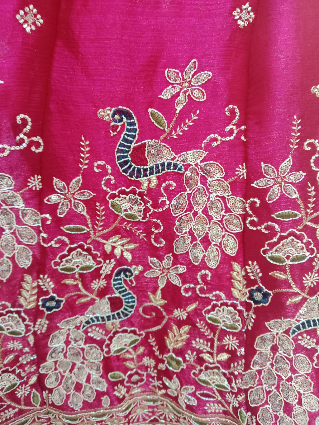 MAROON LEHENGA WITH THE WHITE TEAL PEACOCK BORDER