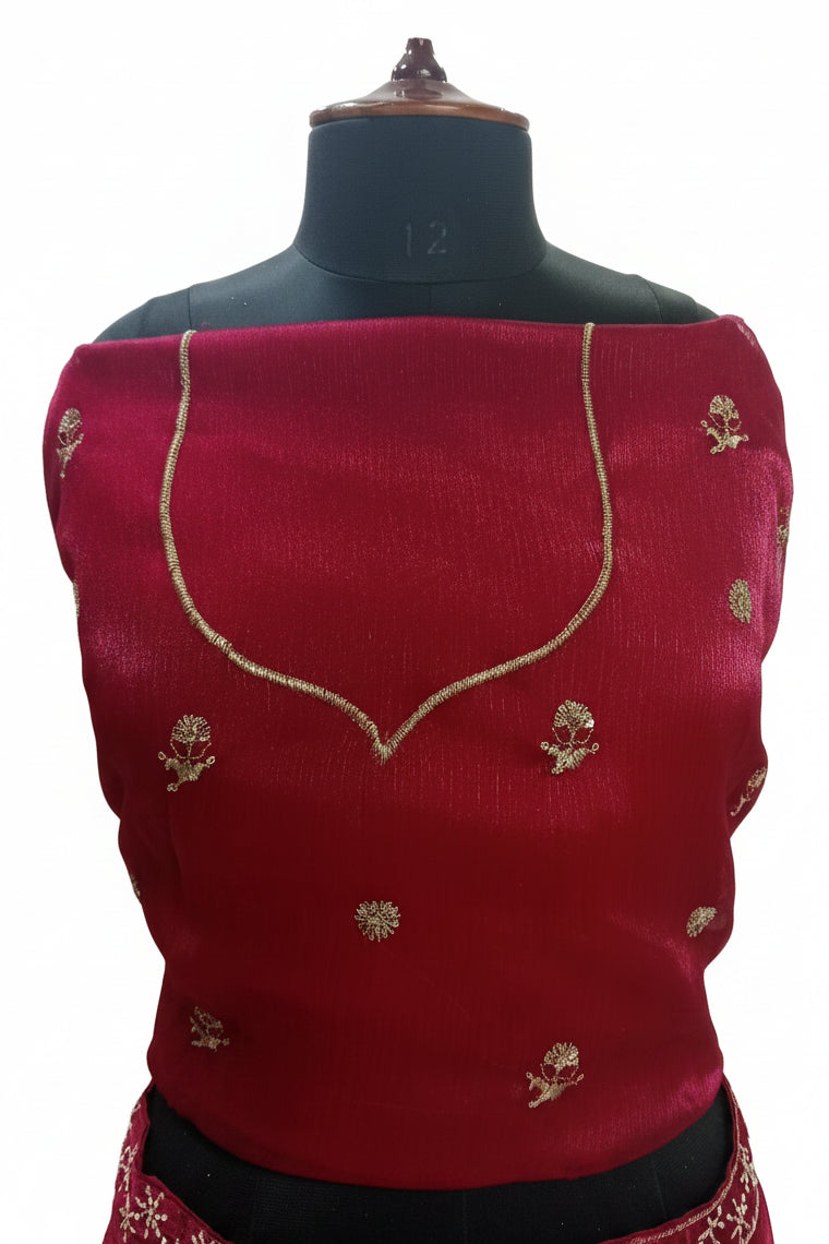 MAROON LEHENGA WITH THE WHITE TEAL PEACOCK BORDER