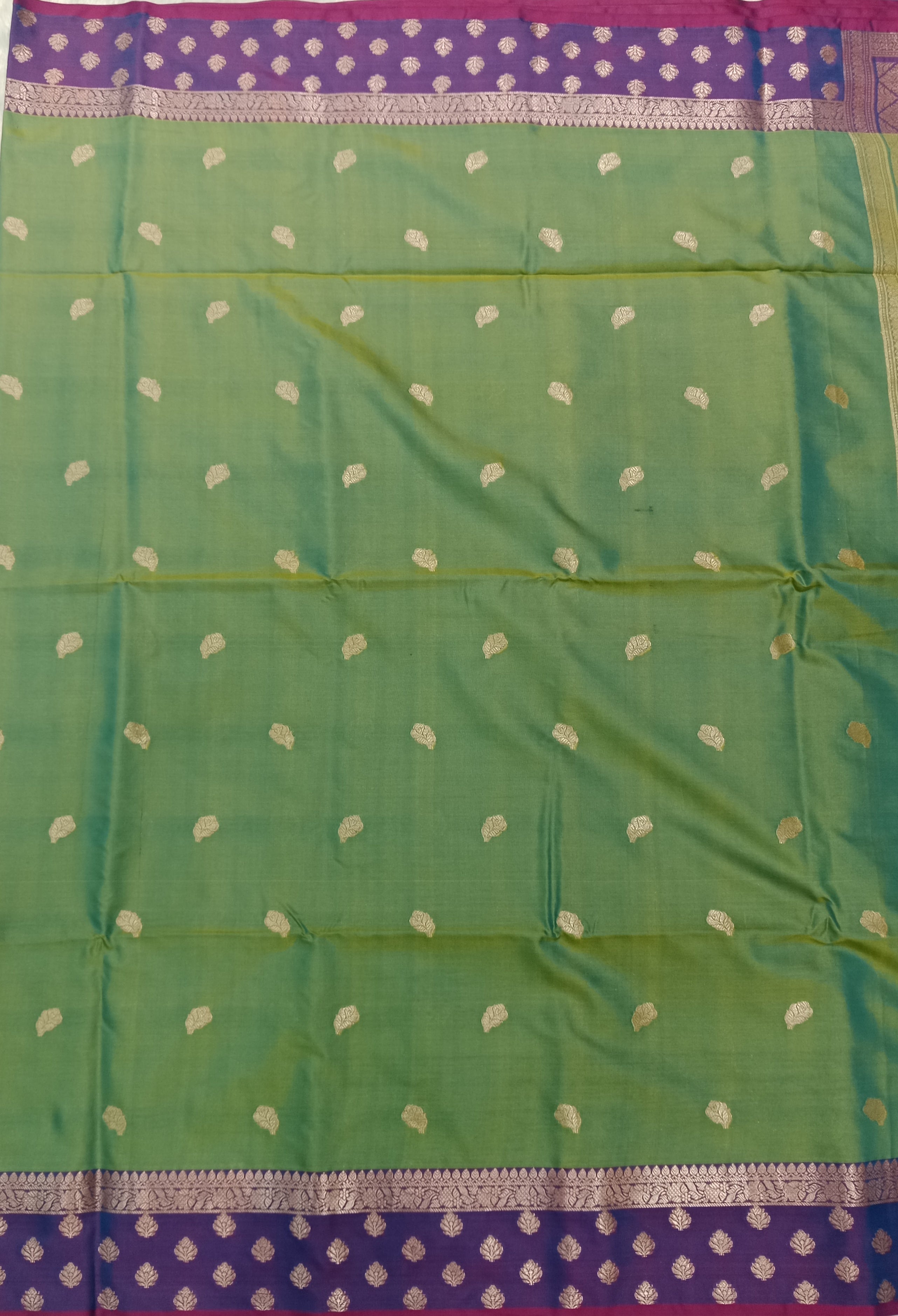 PARROT GREEN KANCHIPURAM SILK SAREE WITH VIOLET CONTRAST BORDER