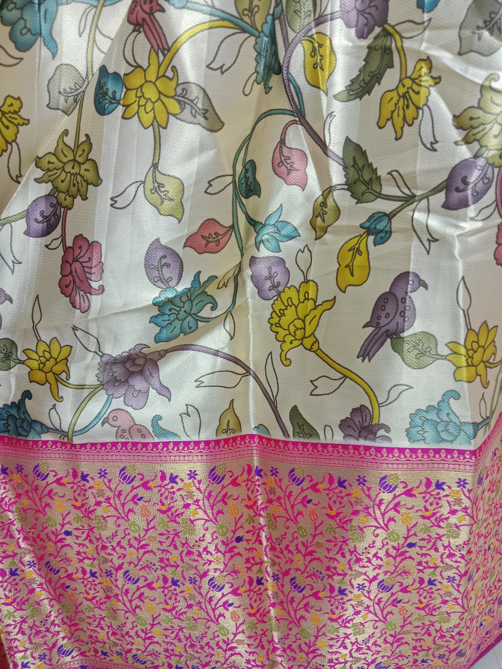 CREAM BASE LEHENGA WITH MULTICOLOUR FLORAL JAAL+ THAT BROAD RED- ORANGE ZARI BORDER